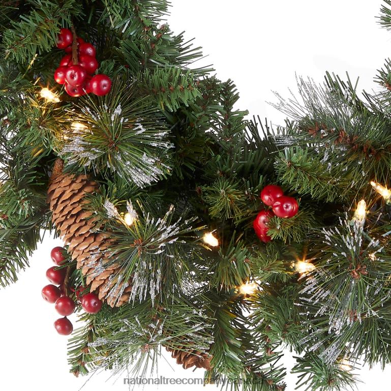 National Tree Company Pre-Lit Artificial Christmas Wreath Green Crestwood Spruce White Lights Plug-In Decorated with Pine Cones Berry Clusters Christmas Collection 24 Inches 68R08220