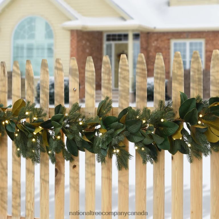 National Tree Company Pre Lit Artificial Garland Magnolia Mix Green Decorated with Leafy Greens Warm White LED Lights Battery Powered Christmas Collection 9 Feet 68R08386